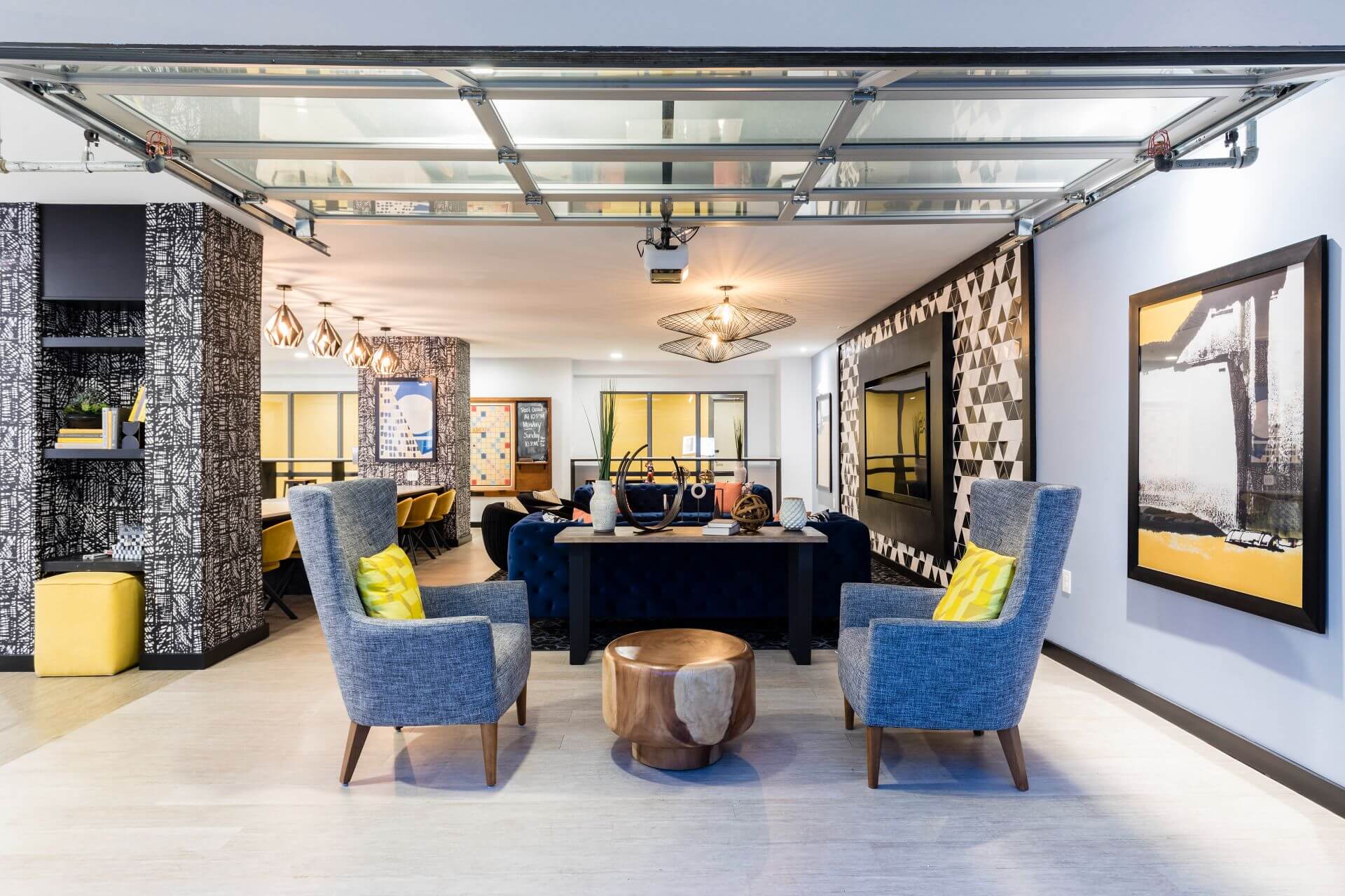 clubhouse with tables and chairs at west & wright apartments